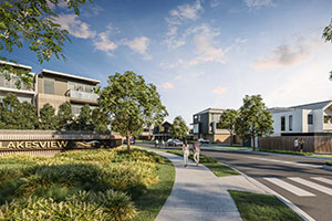 An artist’s impression of Lakesview with townhouses, tree lined streets and families walking along the footpath.